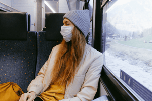 Traveler with sickness mask
